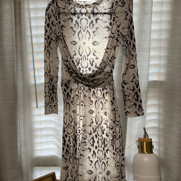 Tickled teal Dresses & Skirts - NWOT Black and white snow leopard mid dress